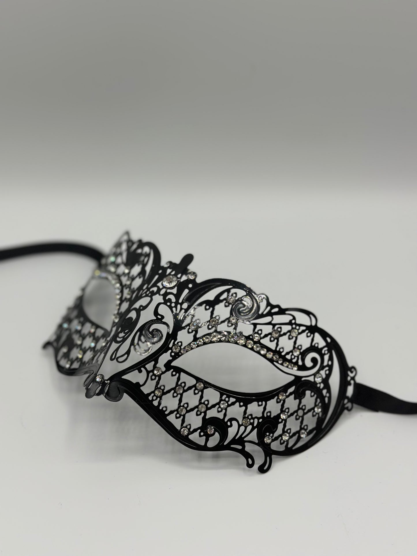 Masquerade mask for women "Seranade" - Venetian mask of black metal with strass stones