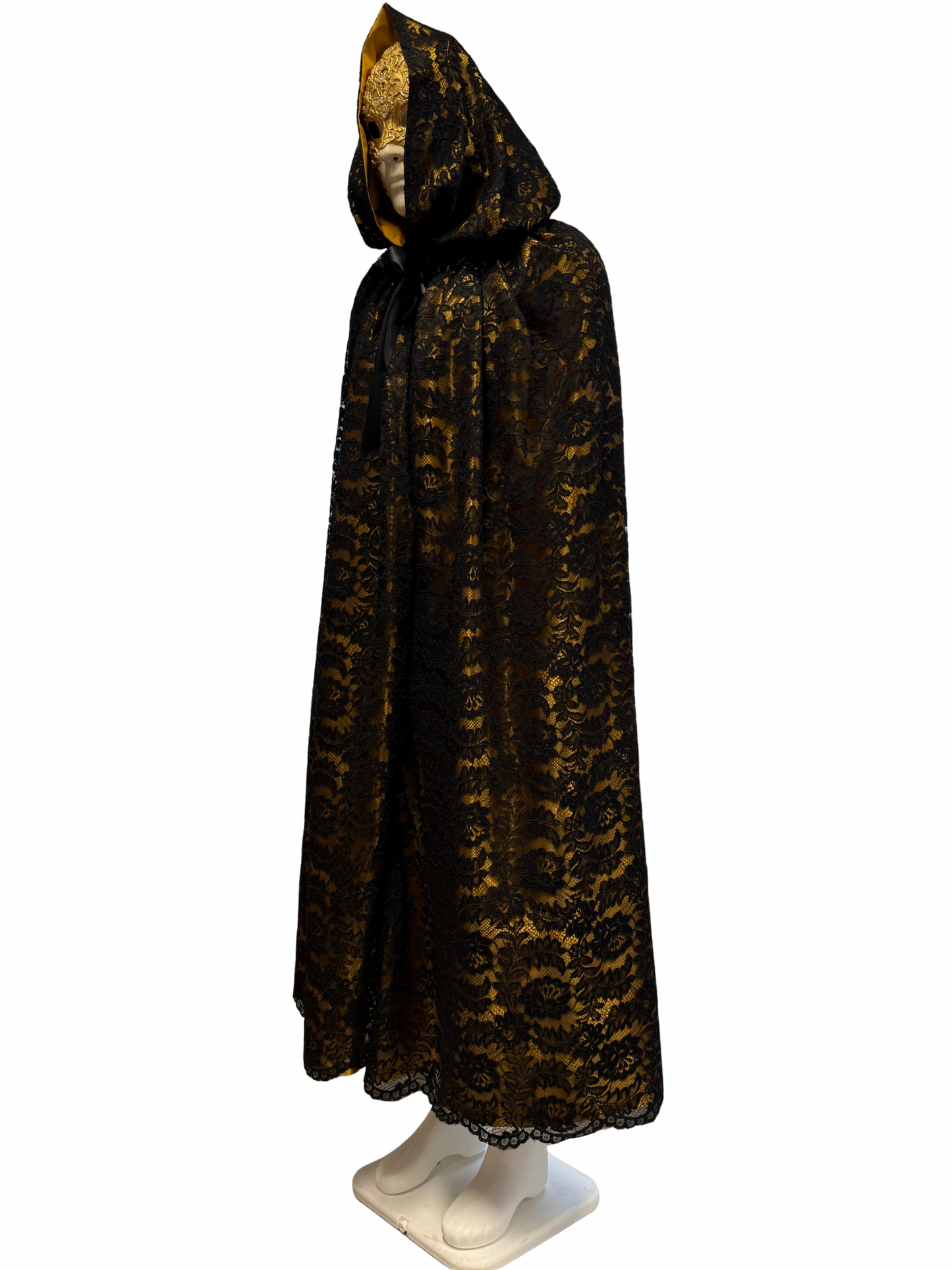 Golden cape covered with black lace with hood