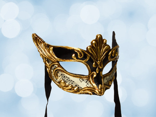 Masquerade mask in black and gold 