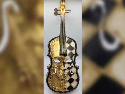 Violín dorado con blanco y negro